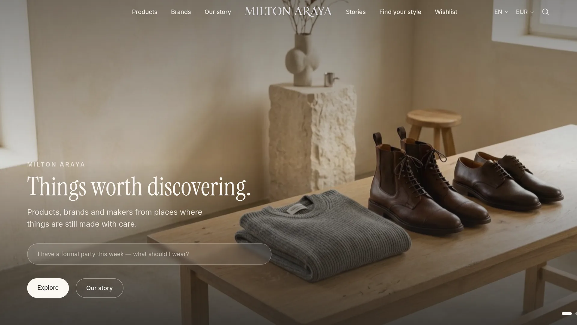 The Milton Araya homepage: leather boots and shoes beside a folded grey sweater on a wooden table, under the headline "Things worth discovering."